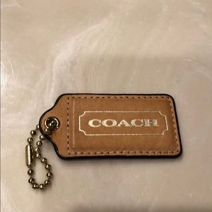 Large Tan Coach Tag